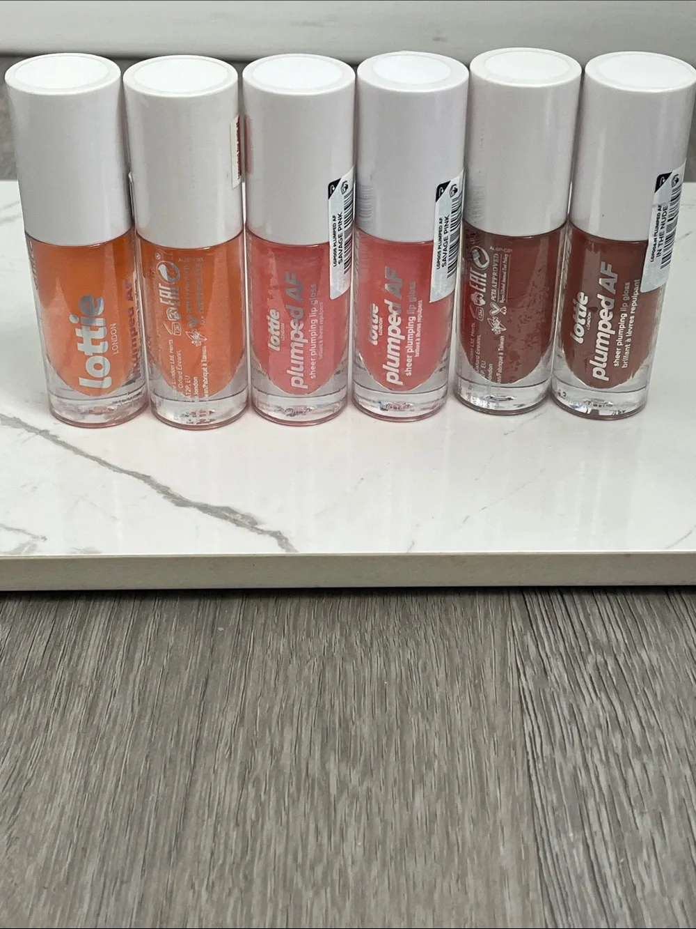 Lottie London plumped AF sheer plumping lip gloss lot of 6 pink , peach, nude